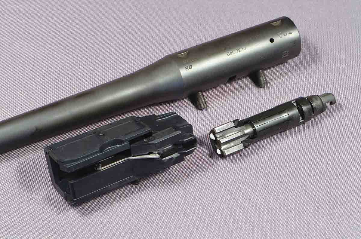 Components of the Blaser R8 .22 Long Rifle rimfire conversion kit include the barrel, breechblock and magazine insert.